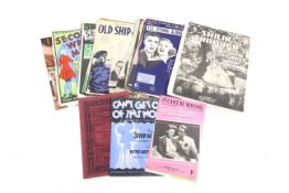 A small collection of sheet music from the 1930s.