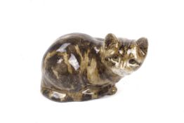 A Winstanley pottery cat size. In a crouched position with glass eyes, marked ' #5'.