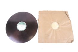 A 1940s WWII period BBC 78 RPM recording disc for radio station distribution.