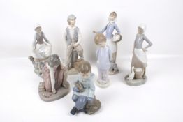 Seven contemporary Nao porcelain figures.