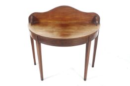 A 19th century mahogany demi-lune table.