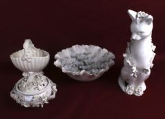 Four pieces of 20th century white glazed ceramics.
