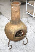 A vintage terracotta chiminea.