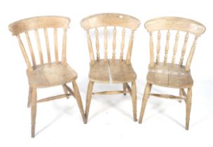 Three farmhouse kitchen chairs. Raised on turned supports united by stretchers. Max.