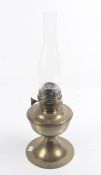 A Victorian brass oil lamp.