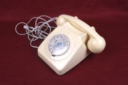 A vintage GPO 8746G Bakelite rotary dial telephone.