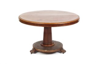 A Victorian mahogany circular pedestal tilt top centre table.