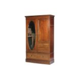 An Edwardian mahogany compactum wardrobe with fine inlaid decoration.