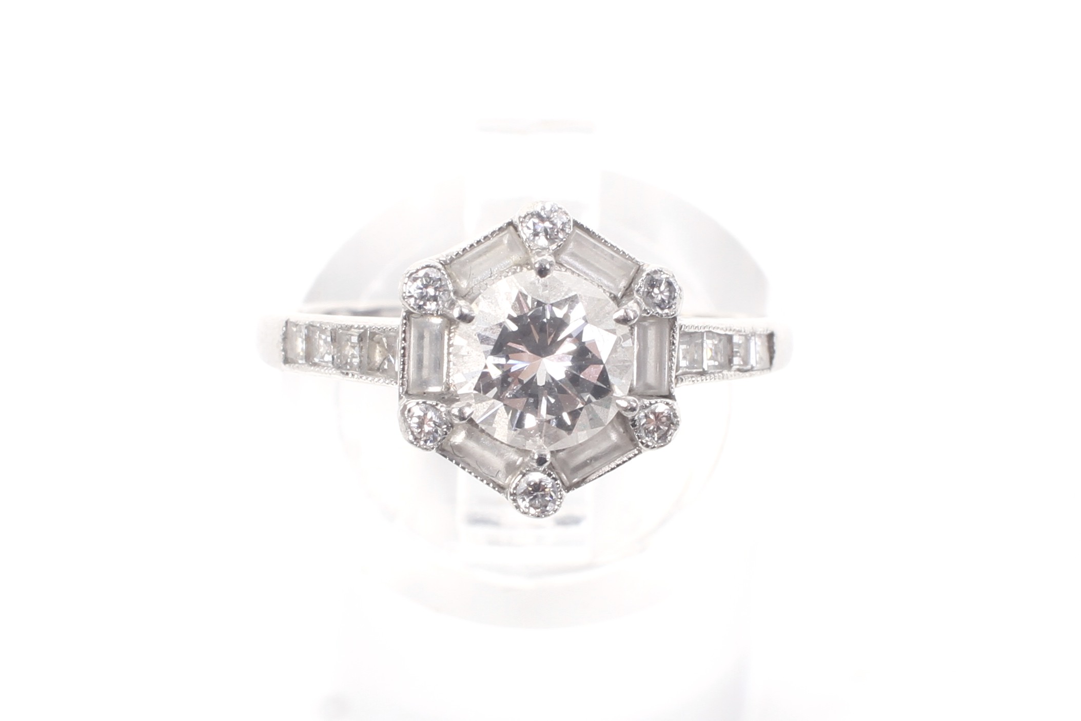 A modern platinum and diamond hexagonal cluster ring, circa 2007. - Image 2 of 12