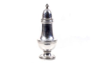 A Continental 830 standard silver vase-shaped sugar caster.