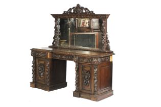 An early 20th century large oak front sideboard with mirror.