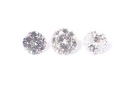 Three loose round brilliant diamonds and a ring mount. Comprising. 0.48cts, 0.36cts & 0.