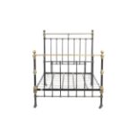 A Victorian brass and iron bed.