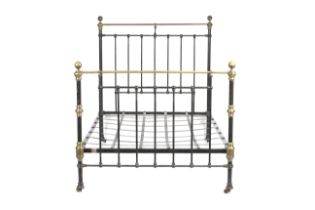 A Victorian brass and iron bed.