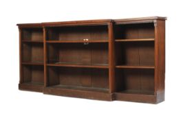 A late 19th/early 20th century mahogany long breakfront open bookcase with two shelves.