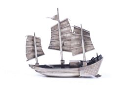 A late 19th century Chinese export model of a junk in full sail. Mark of Wang Hing, approx.