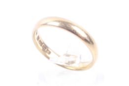 An early 20th century 22ct gold wedding band. Hallmarks for Birmingham 1924, 3.3mm wide, size O, 3.