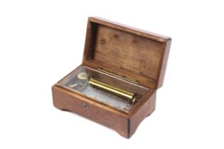 A late 19th century birdseye maple veneer music box.