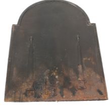 An early/mid-20th century cast iron fire back.