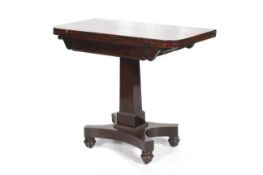 A Regency rosewood pedestal foldover card table.