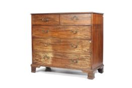 A Georgian mahogany chest of drawers.