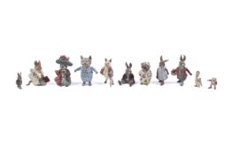 A collection of eleven Austrian circa 1920 cold painted bronze Beatrix Potter miniature figures.