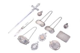 A small collection of silver including an Edwardian round silver vesta/match case.