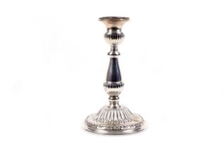 A Peruvan 'Sterling' round candlestick.