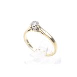 A vintage 18ct gold and diamond solitaire ring. The round brilliant approx. 0.