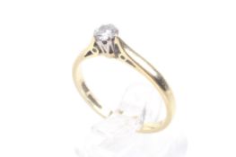 A vintage 18ct gold and diamond solitaire ring. The round brilliant approx. 0.