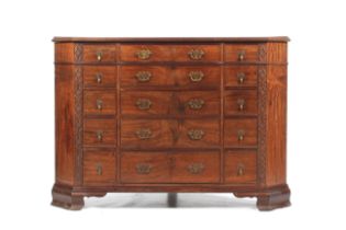A large early 20th century Maples & Co mahogany corner chest.