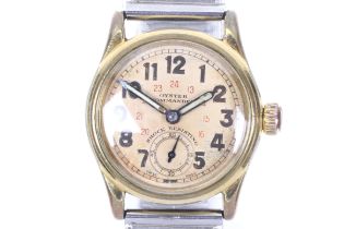 Rolex Oyster, Commander, a mid-size stainless steel and gilt round wrist watch, circa 1945.