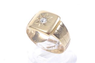 An early 20th century gold and diamond square signet ring.