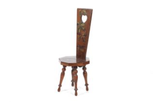 A Welsh Arts and Crafts style mahogany spinning chair.