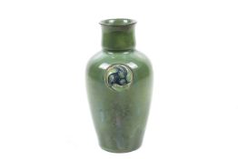 A Macintyre & Co Flammian ware green glaze pottery vase designed by William Moorcroft.