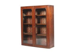 A Victorian mahogany glazed cabinet.