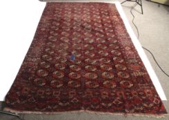 A large hand woven rug/carpet.