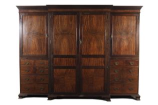 A Maples & Co mahogany quadruple breakfront compactum wardrobe.