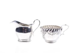 Two Victorian and later silver cream jugs.