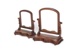 Two similar Victorian mahogany dressing table mirrors.
