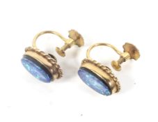A pair of oval opal-doublet single stone screw earrings.