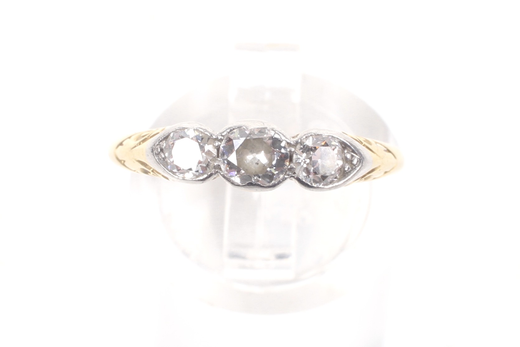 An early 20th century platinum-flashed gold and diamond three stone ring. - Image 2 of 8
