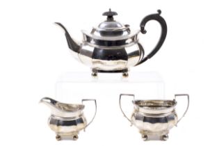 A silver shaped-oval three piece tea service.