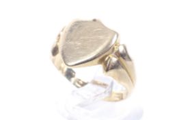 A late Victorian 18ct gold shield-shaped signet ring.
