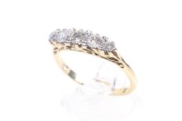 A vintage gold and diamond five stone carved half-hoop ring.