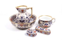 An Imari pattern five piece vanity set.