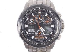 Citizen, Eco-Drive, WR200 Titanium, a gentleman's titanium and black ceramic(?)round bracelet watch.