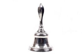 A Dutch 833 standard silver mounted brass table bell.