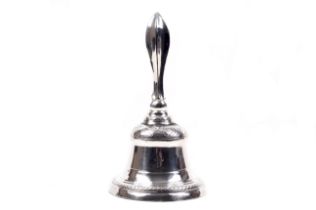 A Dutch 833 standard silver mounted brass table bell.