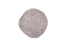 A Charles I hammered Commonwealth Sixpence coin.